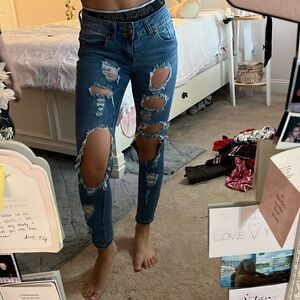 Ripped blue skinny jeans